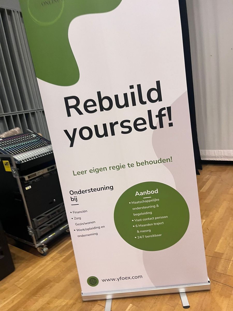 YFOEX stand with information about the Rebuild Yourself programme